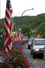Fourth of July flags and colorful flowers in Gatlinburg, Tennessee.