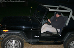 Jim pulling in the driveway after a cold ride home with the soft-top down... in our 'old' 1990 Jeep Wrangler YJ.