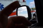 I saw so many ambulances passing in the course of 30 minutes on this one day that I couldn't always get my camera out in time to capture it.
