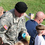 A U.S. Army soldier in the audience at Marine Boot Camp graduation.