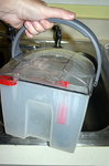 Bissell Proheat water container that holds clean and dirty water.