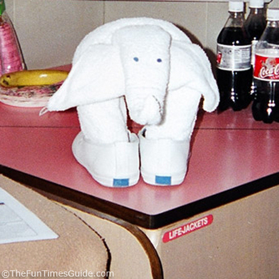 folded-towel-elephant-wearing-shoes.jpg
