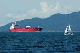 freighter-ship-and-sailboat-by-Laura-Grace.jpg