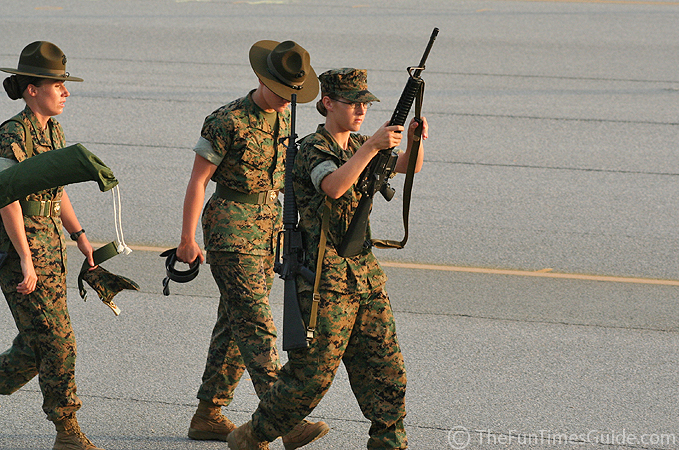 girls with guns images. The crowd, filled with