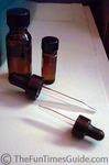 Glass eyedroppers and amber bottles.