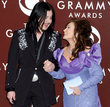 Jack White and Loretta Lynn accepting an award at the 2005 Grammy Awards. Photo copyright Gregg DeGuire.