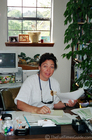 Jean Benchimol at her desk at The Gulf Breeze Zoo.