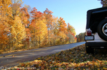 Jeep parked along the Natchez Trace, surrounded by fallen leaves.