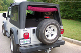 The rear window of our Jeep Wrangler Unlimited... with a towel to prevent scratches.