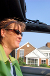 Riding in the Jeep Wrangler Unlimited with the Sunrider top open... notice the black strap 'securing' the arms in place?
