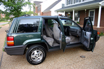 Jeep Grand Cherokee with the doors open to show how great the guys at the Super Shine Detail Center got this Jeep looking!