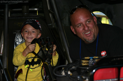 jim-helps-tiny-tots-get-in-the-race-car.jpg