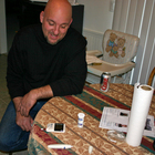 Jim testing his blood glucose.