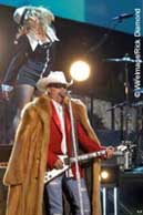 john-rich-cma-awards-peta-fur-coat.jpg