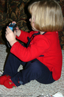 3 year old Karly taking pictures with her new FILM camera... Karly got two cameras this Christmas... one digital camera from us, and one film camera from Grandma.