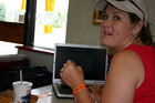 Lynnette enjoying her McWi-fi... and a french fry.