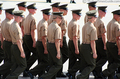 Something about 'rank' -- Private vs Private First Class -- determined who looked at superior officers as they marched by, and who was required to continue looking forward.