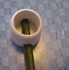 A closeup of the end of the rod used on Mother's laptop computer stand. mothers-computer-shelf-rod-end.jpg