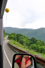 Lynnette photographing the winding roads and scenery.