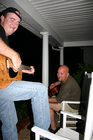 Playing guitar.