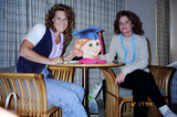 A silly Graduation photo... staged around silly Graduation decorations.