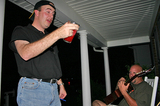 Mike drinking strawberry daiquiris on the front porch.
