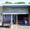 The Bluebird Cafe on a quiet afternoon... all the action takes place in the evenings. You can tell by this photo, that The Bluebird is simply a tiny, hole-in-the-wall kind of bar located in a strip mall. The Bluebird is known for its 'in-the-round' songwriter nights featuring 3 to 5 songwriters strumming their guitars.