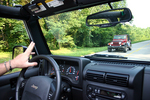 Two Jeep Wranglers passing along the Natchez Trace Parkway.