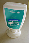 This handy gadget lets you store any bottle upside down and dispense the product from the flip-up lid.