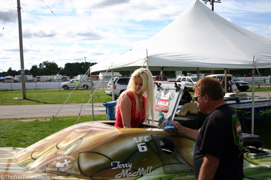 wrif-taylor-robinson-climbing-out-of-race-car.jpg