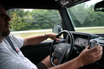 Jim attempting to hone in on a particular station on XM Satellite Radio WHILE he's driving.