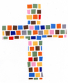 A patchwork cross made from colored paper squares.