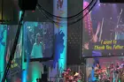 An example of the big screens, loud colors, and Christian rock musicians that highlight every service at BCC.