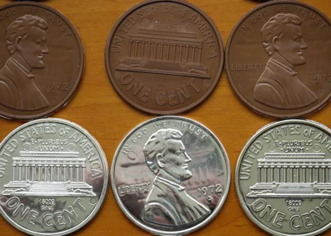 Silver looking pennies are caused by several different things.