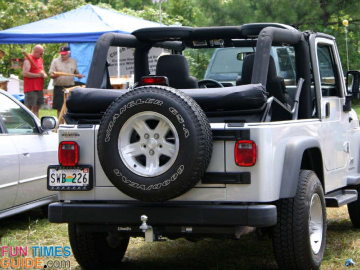 This is our Jeep Wrangler with the Clover Patch Window Roll Tote securely in place in the back. It keeps your Jeep windows from getting scratched! 