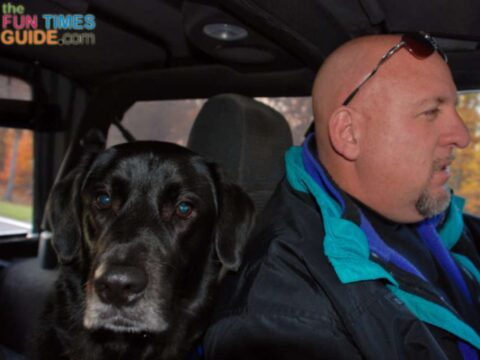 I couldn't find a picture specifically with our Jeep rear window open in the winter snow, but here's a cold autumn day that required winter coats... and, as you can see, the Jeep Wrangler rear window is open.  