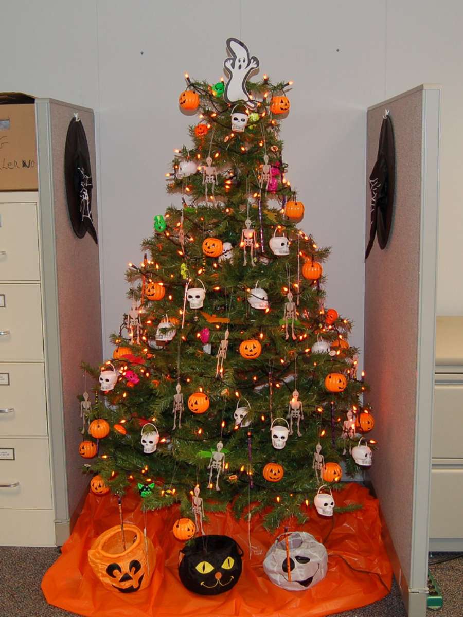 A more traditional looking Halloween Christmas tree -- with fun Halloween decorations on it.