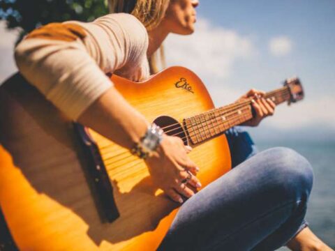 Want to learn to play the guitar? Add it to your summer bucket list!