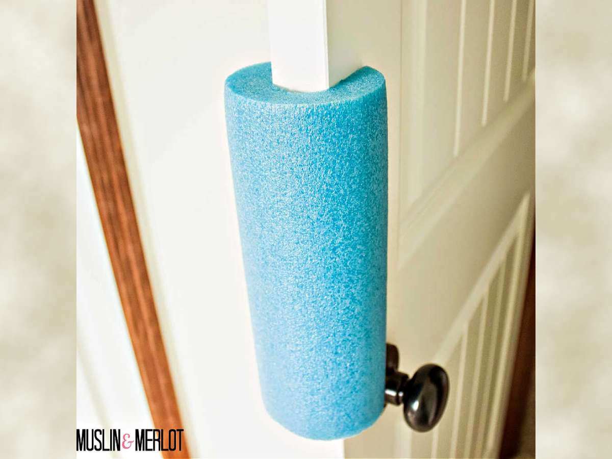 A simple pool noodle can be used as an easy makeshift door stopper! photo by Muslin & Merlot