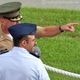 A Marine officer talking to an Air Force officer who was in the audience.