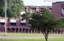 Another class of recruits marching with rifles. You can see their freshly-shaved heads... even from this distance!