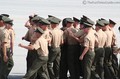 The newest class of basically trained Marines rushing to hug and applaud one another.