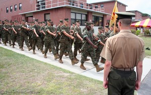 A new graduate watches as a new class of recruits begins training. In his own words: 'Pitiful.' It was obvious how much is learned by the time a Marine recruit graduates.