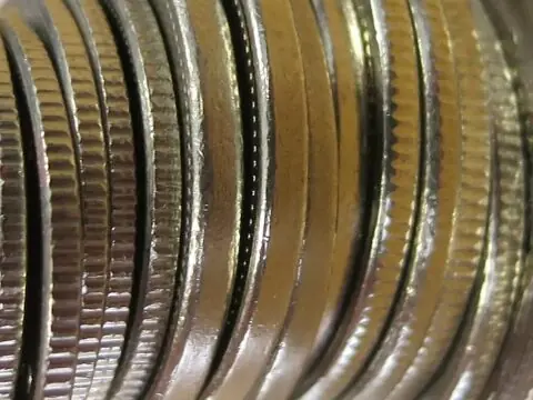 Coin rim errors can be worth a lot of money! photo by ruthanddave on Flickr. You have to look close up with a magnifying glass to see coin rim errors.