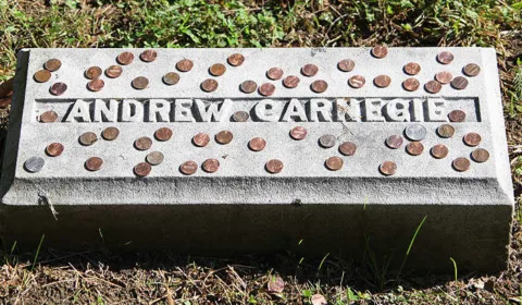 Why Do People Put Coins On Graves? (And Other Unique Traditions Involving Coins)